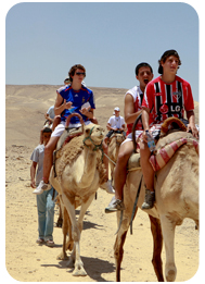 family-camel-ride-desert-safari-tour-riding-in-dubai-camel-trekking-safari-dubai